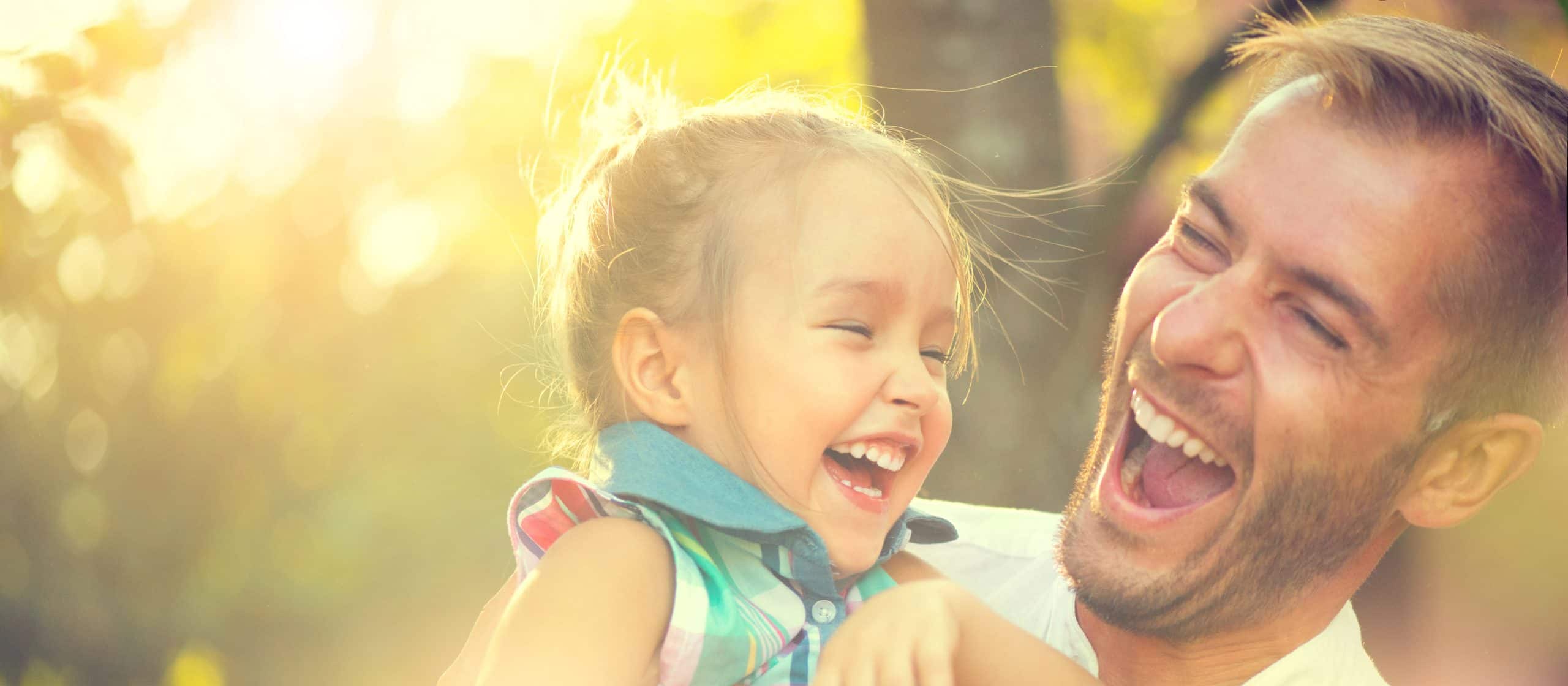 man and daughter enjoying their Family Backyard Design