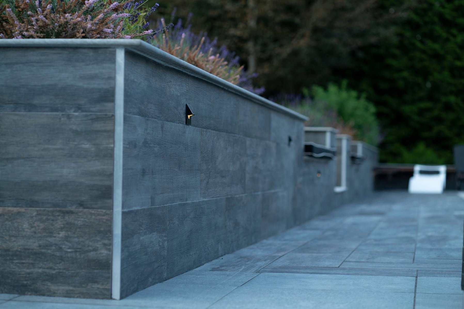 Clean hardscape and mature plantings on a commercial property — Father Nature maintenance work