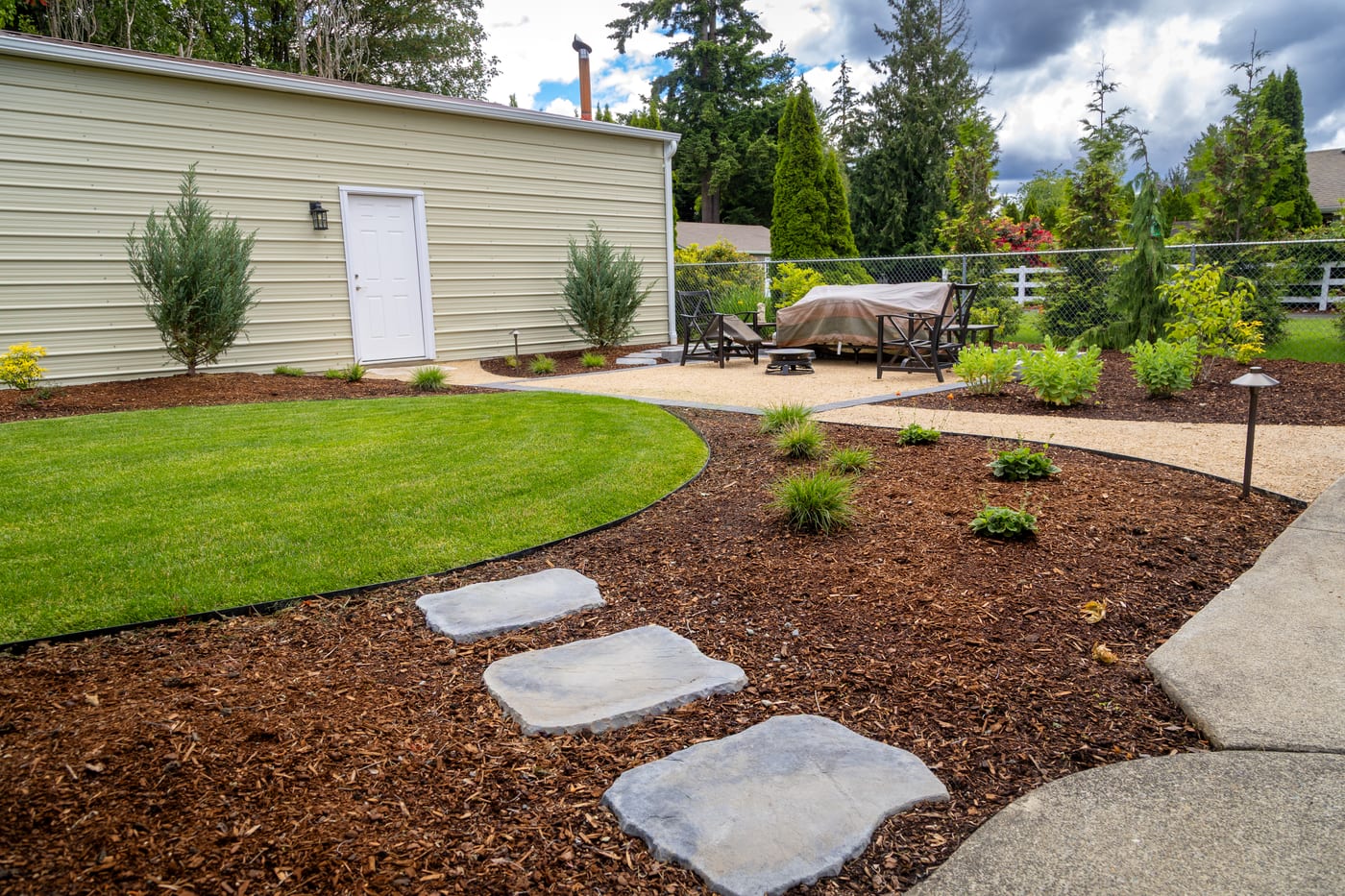 New lawn with stepping stones and the garden shed