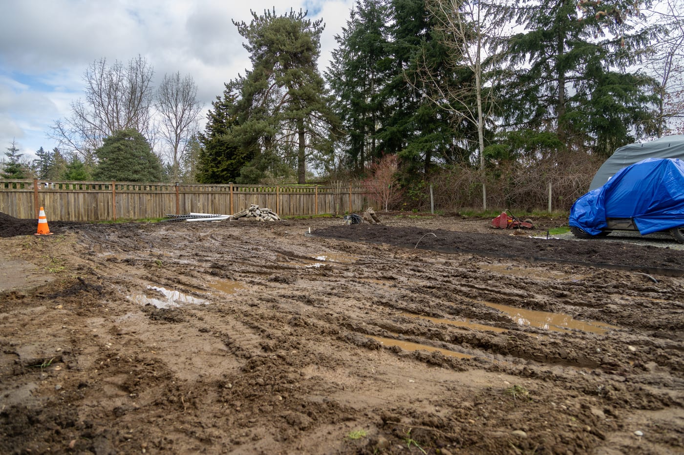 The backyard graded flat and ready for new lawn